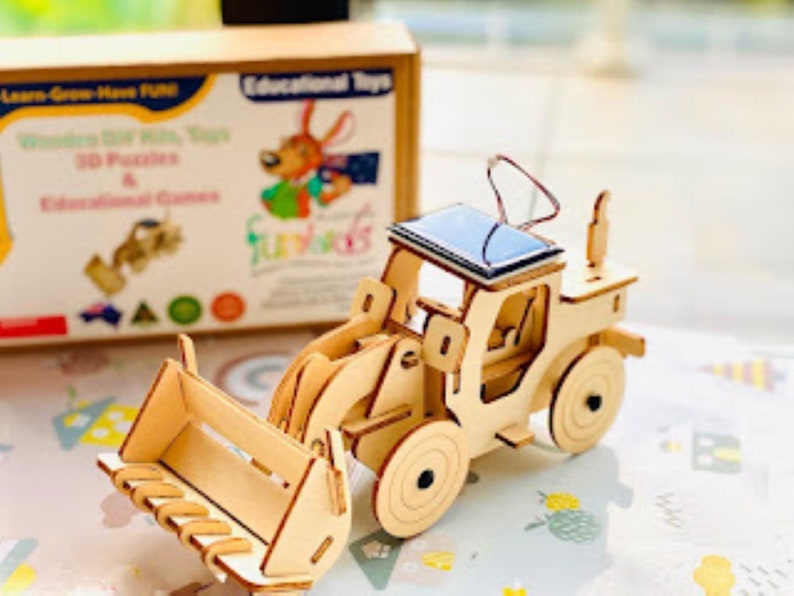 Model Bulldozer Tipper truck: Solar or battery powered plywood model-includes Motor or Solar powered options plus paint brush set Secondary image