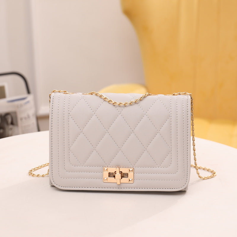 Chic Quilted Crossbody Bag in Grey with Gold Chain Strap Main image