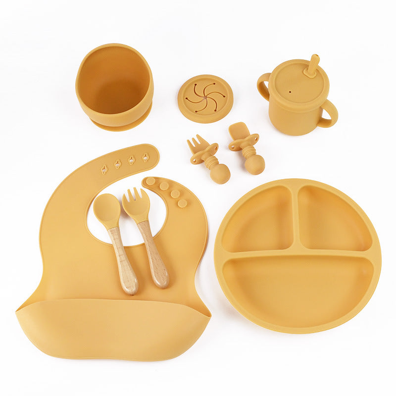 Yellow 8-Piece Silicone Children's Tableware Set - BPA-Free Baby Feeding Utensils with Wooden Fork and Spoon, Cup, Bowl, and Bibs Main image