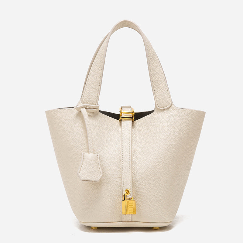 Beige Elegant Women's Leather Tote Handbag with Gold Lock Detail Main image