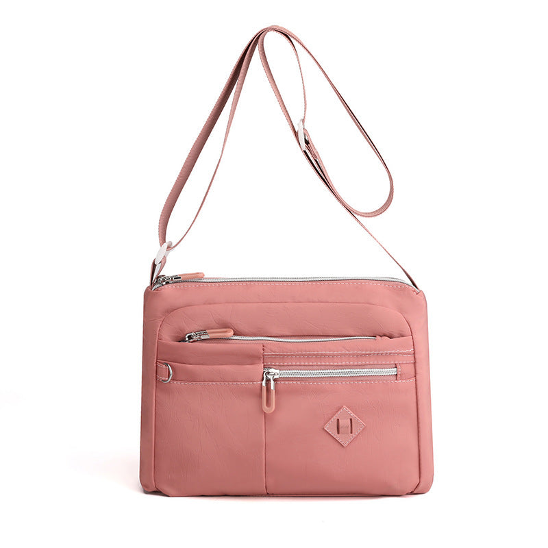 Lightweight Nylon Crossbody Shoulder Bag - Pink, Adjustable Strap, Multi-Pocket Design Main image