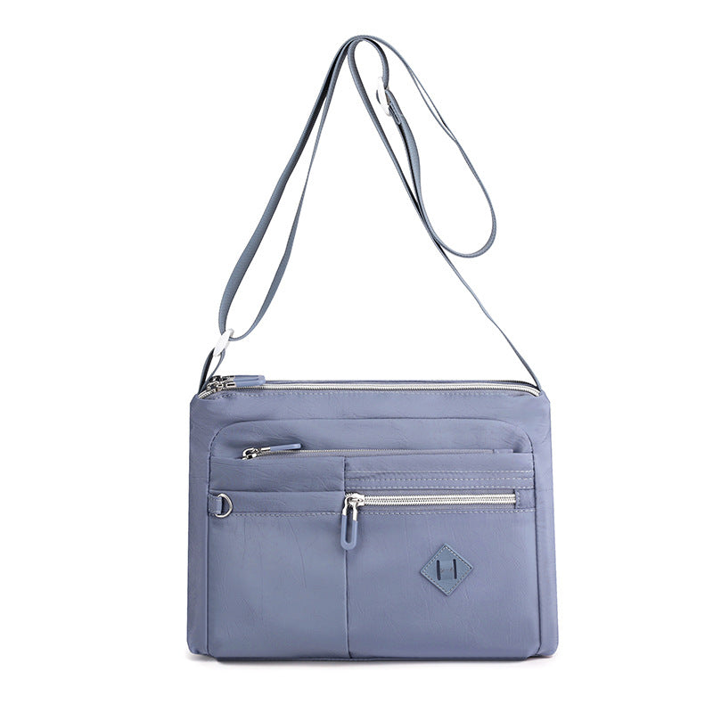 Lightweight Nylon Crossbody Shoulder Bag - Light Blue, Adjustable Strap, Multi-Pocket Design Main image
