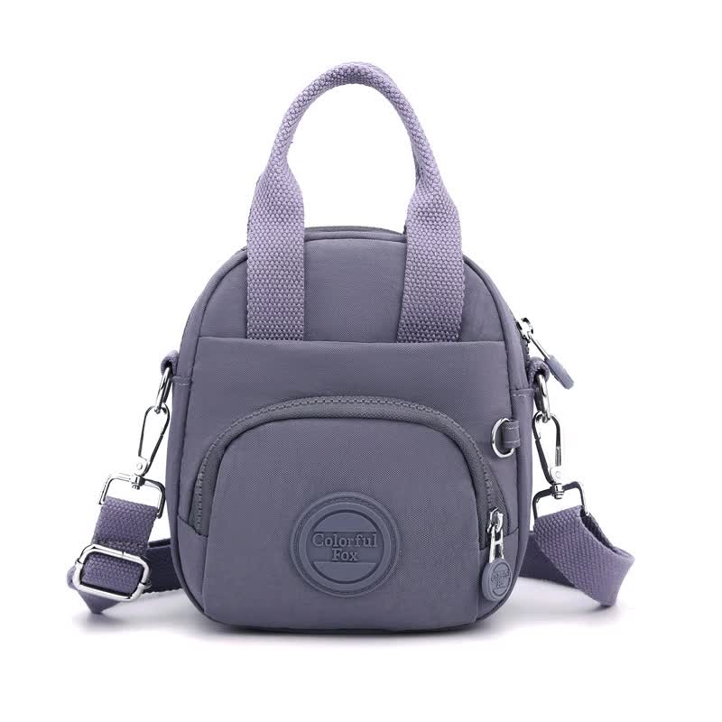 Purple Mini Waterproof Nylon Backpack - Lightweight Casual Crossbody Bag Main image