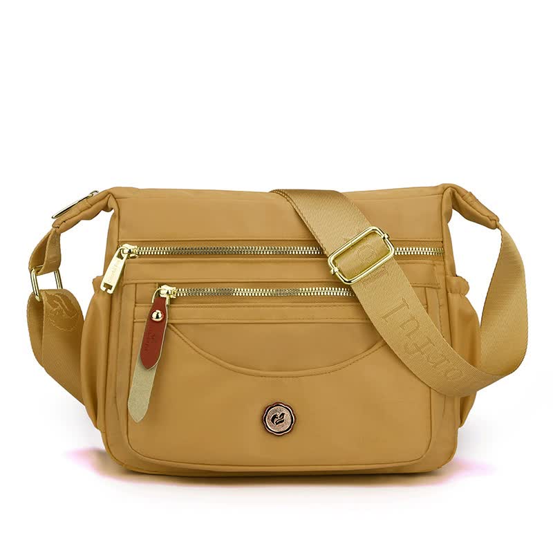Gold Nylon Crossbody Bag with Multiple Compartments - Compact and Stylish Design Main image